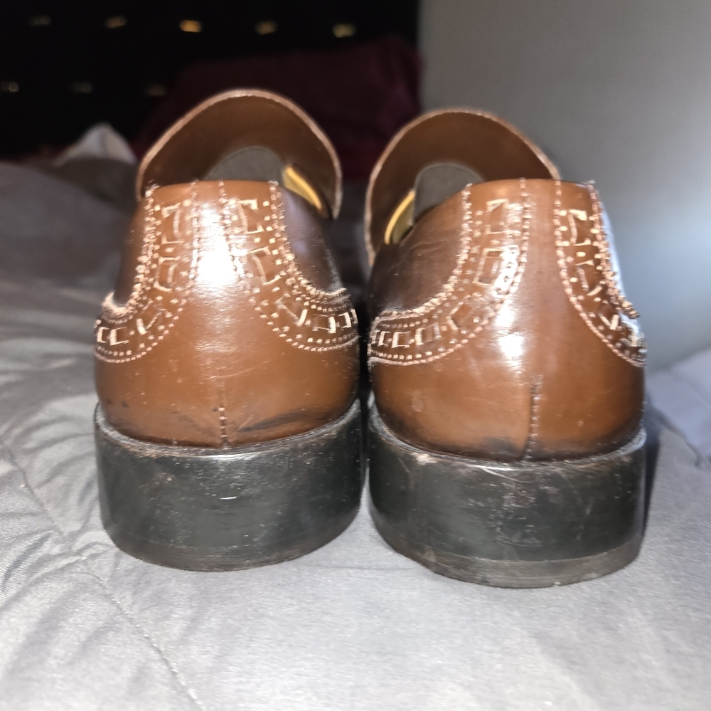 lv shoesnice well taken care of.lv badges still in place.
